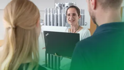 PEM Electrolysis team in front of a Bosch PEM electrolysis stack